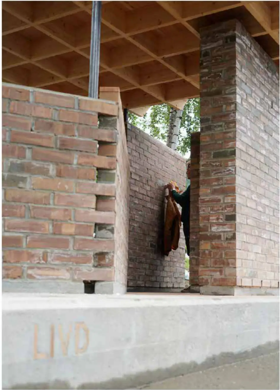 Brick entrance with LIVD cast into the concrete base