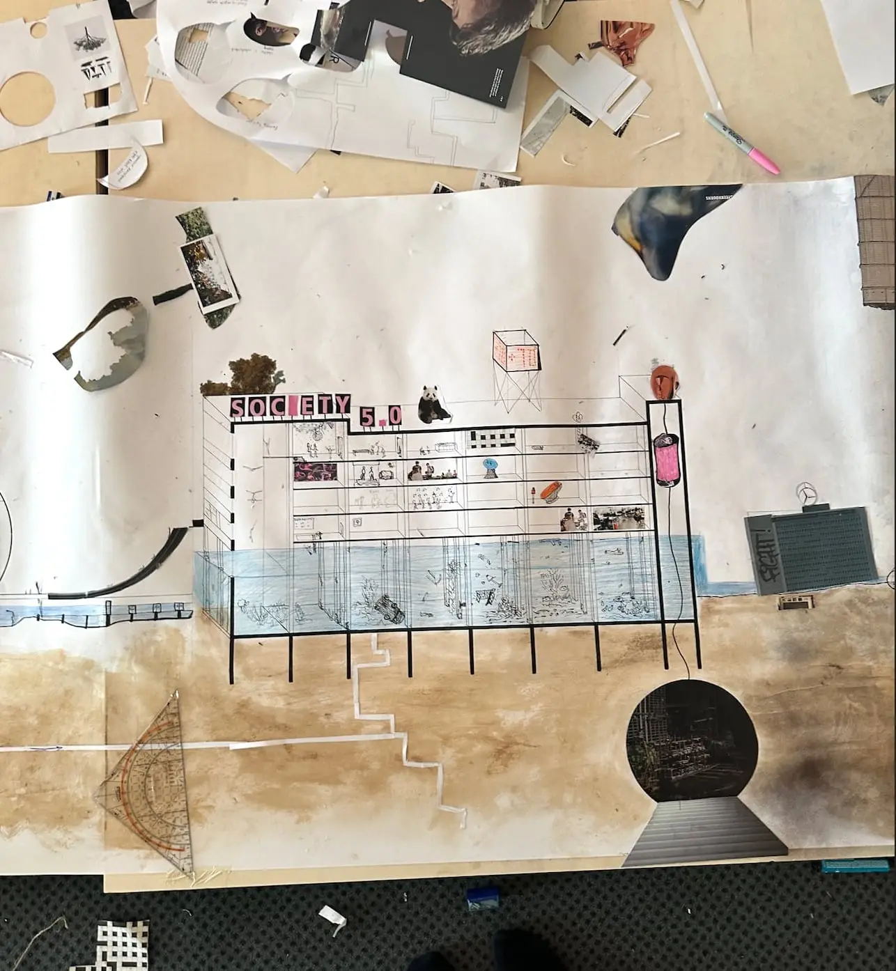 Part of the section from above: collaged drawings, water lines and cut-outs on stained paper