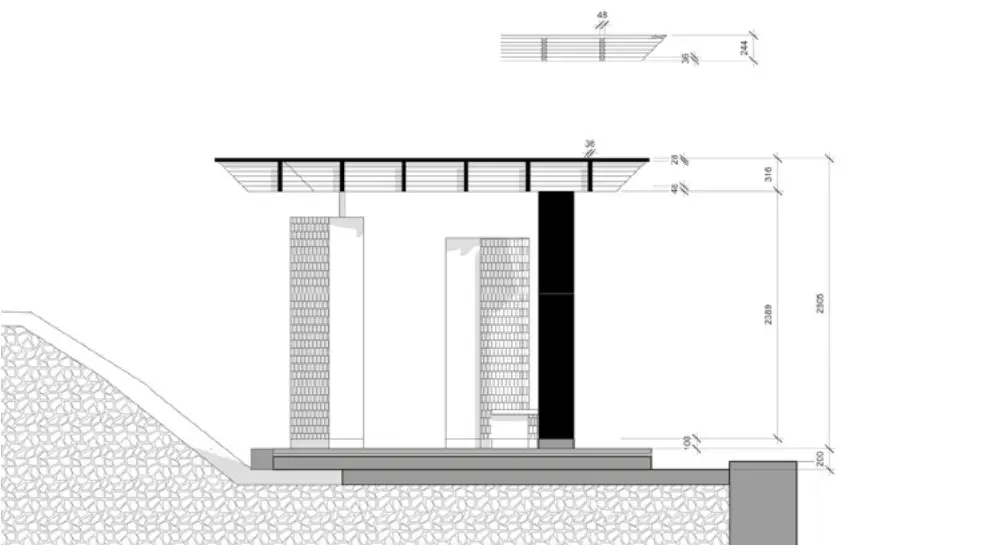 Technical section through the pavilion showing the roof, the brick piers and the sloping ground