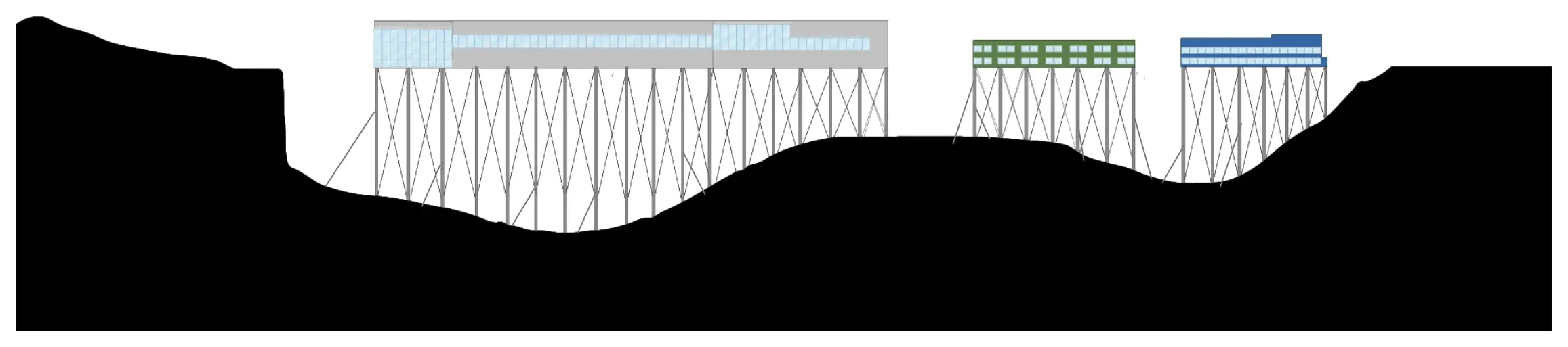 Black section of the valley with the kept buildings standing on long braced piles